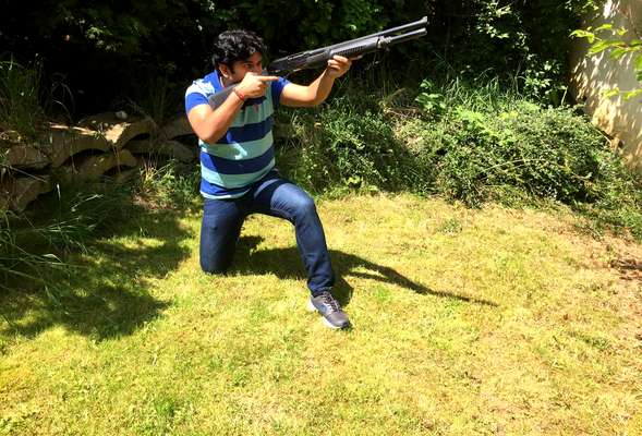 Pump action shotgun
