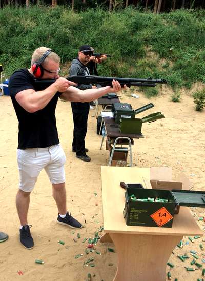Pump action shotgun